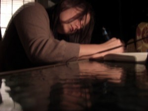 meredith writing in a journal